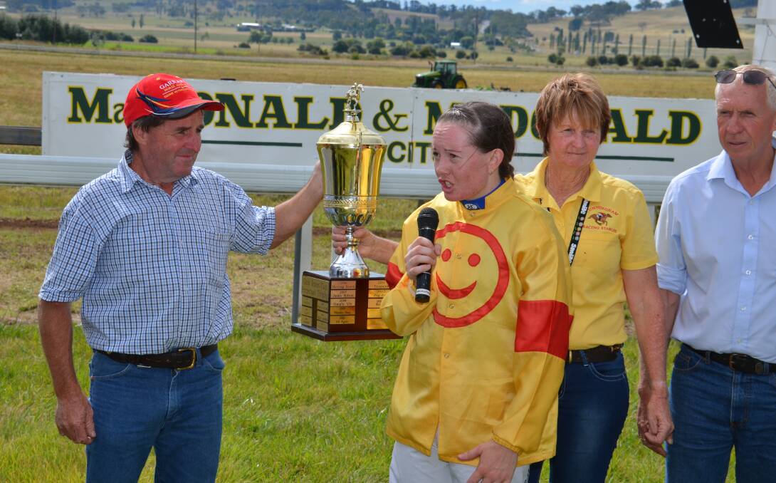 Triple chance: Trainer Paddy Cunningham and jockey Jodi Worley with last year's Glen Innes Cup. Cunningham has three horses nominated for the 2017 Cup, including 2016 winner Carry Me Gee Gee.