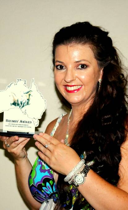 Rachel with her Brumby Award for Best Female Gospel Song of the Year in Australia. Photo by: Tracey Boxsell