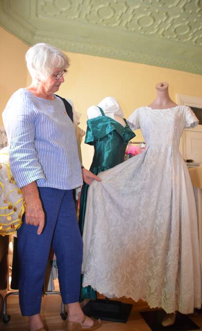 Jenny Sloman with some of the historical garments being prepared for this year's Glen Innes Show.