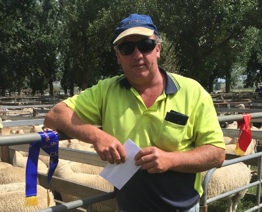 Michael Grob with his prize sheep at Glen Innes saleyards for the annual Yasloc show and sale.