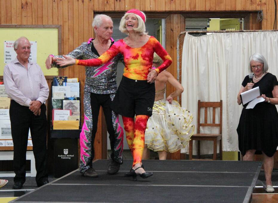 Popular: Malcolm Wehr Historical Society president Denis Haselwood and Cathy Wheatley parading costumes, with Jenny Anderson compering. Photo: S. Gregori.