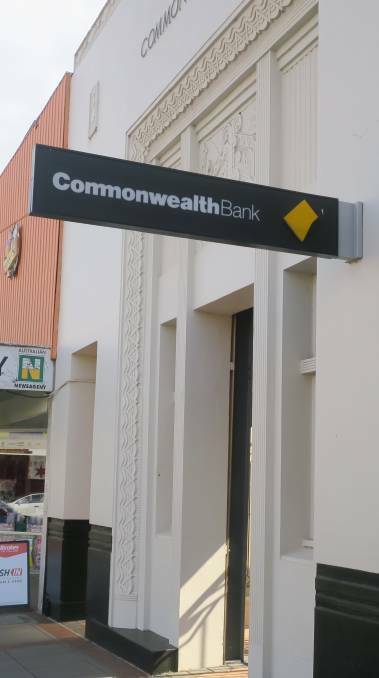 Crime scene: Staff raised the alarm before an off-duty officer arrested the woman  outside the Commonwealth Bank in Grey St, Glen Innes. Photo: Steve Evans 