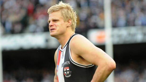 Nick Riewoldt is shattered after 2009 grand final loss to Geelong. Photo: Vince Caligiuri
