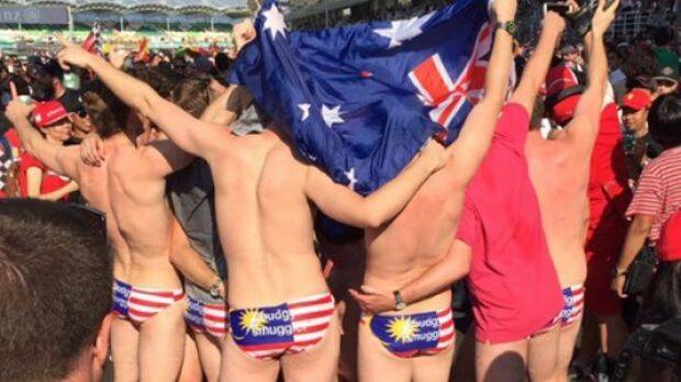 Australians arrested in Malaysia for stripping down at the Grand Prix.  Photo: Twitter/@nikasyraaf