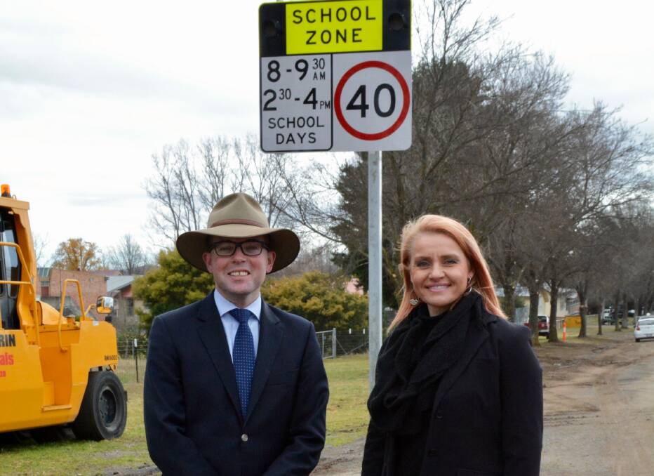 Northern Tablelands MP Adam Marshall with Glen Innes High School deputy principal Shelly Way at the recently installed set of flashing lights.