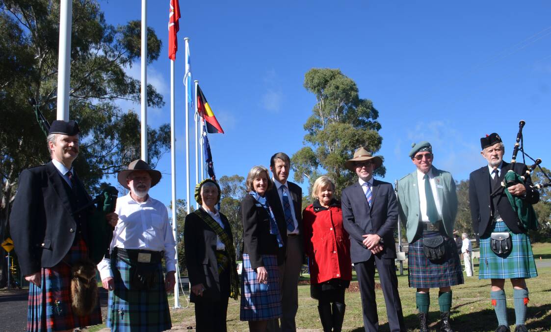 SPECIAL CEREMONY: Members of the Standing Stones Management Board, Council and Northern Tablelands MP Adam Marshall attend the flag raising ceremony on Monday.