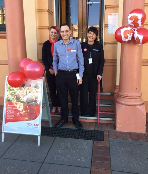 MAJOR MILESTONE: Team members standing outside Westpac Bank in Glen Innes to promote the new funding initiative as part of the bicentenary celebrations. Photo: Contributed.