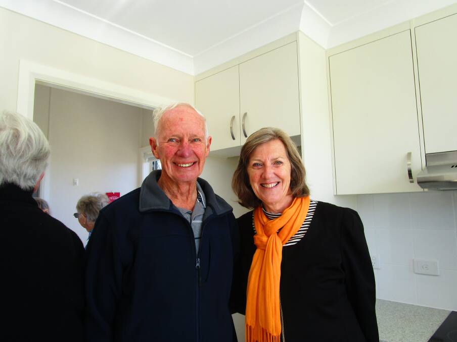John Page and mayoress Judi Toms touring the renovated cottage.
