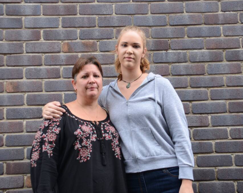 HORRIFYING ORDEAL: Lida Jansen and her daughter, Jessie Sanders, are calling for better signage and patrolling in flood-prone areas after 19-year-old Jessie almost lost her life crossing the Emmaville bridge recently.