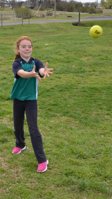 WHAT A CATCH: Ella Carberry about to catch out a batsman.