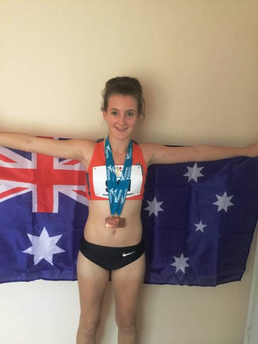 BRONZED ATHLETE: Proud Aussie Mikielee snow with her medals from Fiji