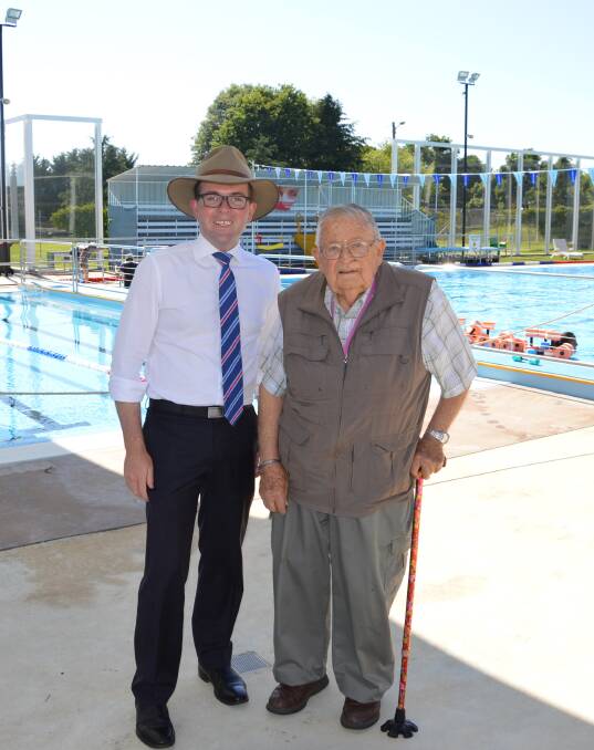 In the shade: Northern Tablelands MP Adam Marshall, left, with Glen Innes Swimming Club Director Warwick Twigg at the pool complex last week.