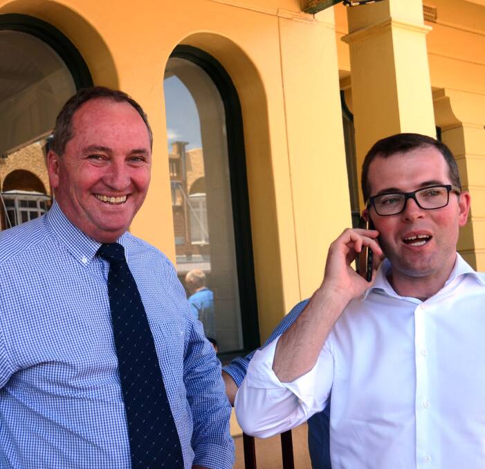 HOLD THE PHONE: Deputy PM Barnaby Joyce and Local MP Adam Marshall enjoy better mobile phone coverage thanks to a new mobile base station in Pinkett. Picture: Craig Thomson.