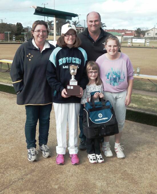BOWLING THEM OVER:  Haylee Ross with her Mum Kylie, Dad Paul and Sisters Indi and Britney after her win.