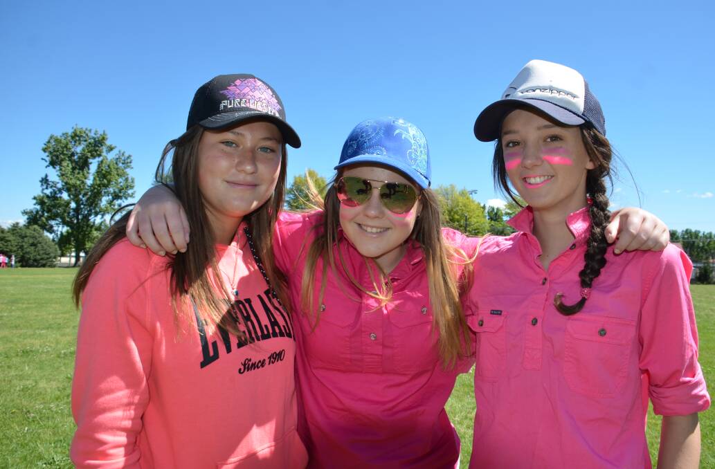 LOOKING COOL IN PINK: Tori Potter, Kirra Durkin and  Lily Coldham.