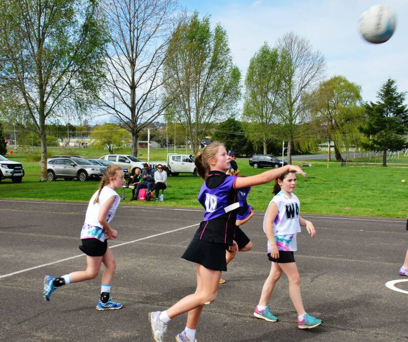 Sophie McCormick throws a perfect pass to a team-mate.