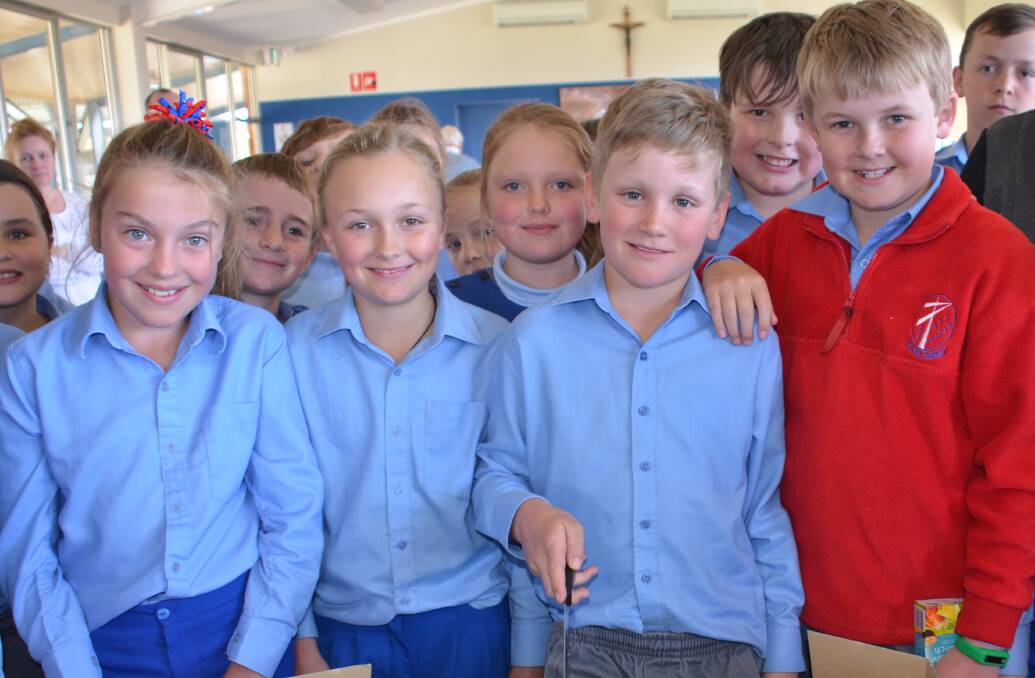 ALL SMILES: Students from St Josephs enjoying celebrating thier NAPLAN results
