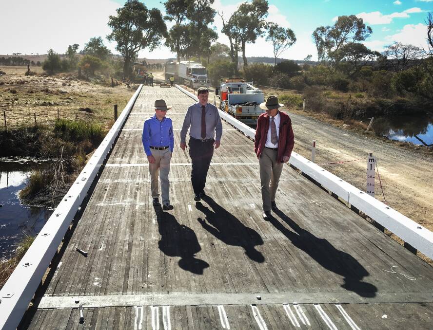 KUDOS: Local MP Adam Marshall, Council's Keith Appleby and Colin Price walk across the bridge.