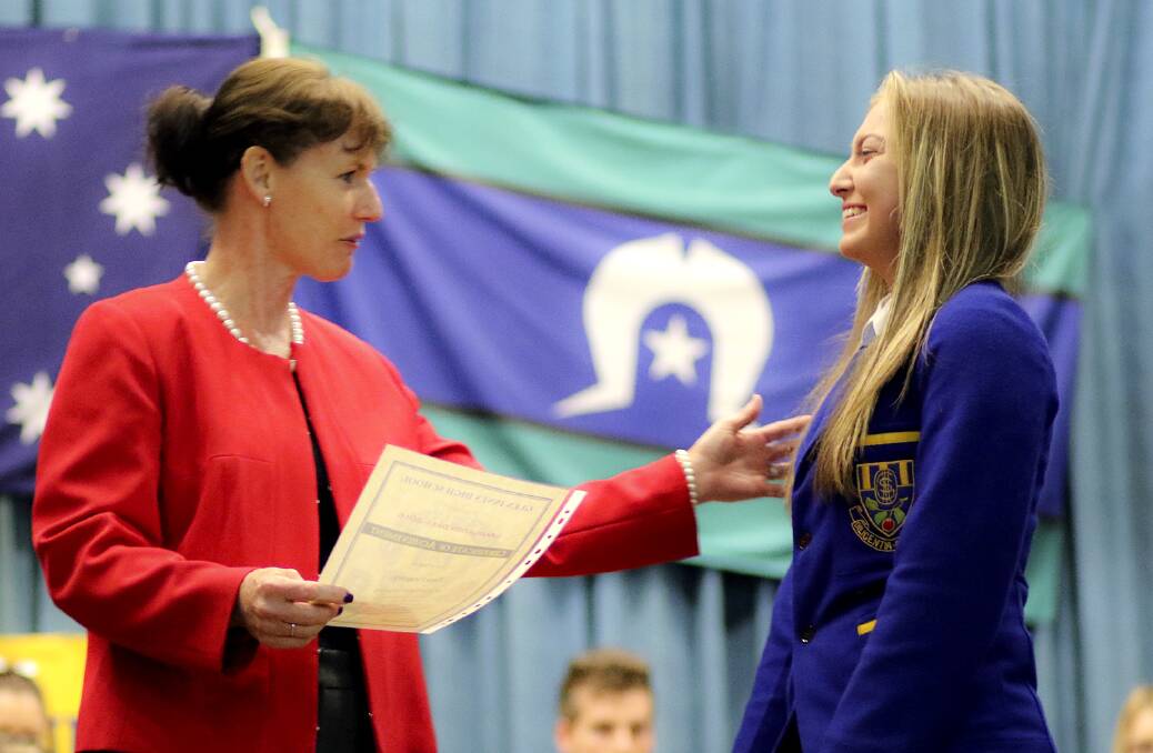 AWARDS:  Director Public Schools New England  Sue Brown gives Taya Heagney her Academic Award. 