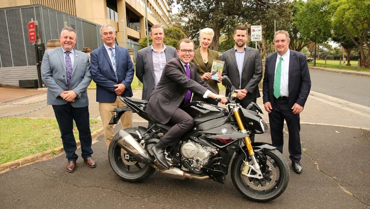 Tourism Minister Adam Marshall at the launch with the mayors of Armidale Regional Council, Walcha Council and Uralla Council, Rob Gallagher, CEO of Hema Maps, BMW Ambassador Kate Peck, and National Marketing Manager BMW Motorrad Nigel Harvey.