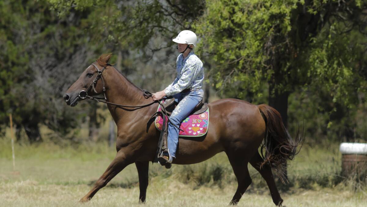 HORSING AROUND: Ashley Donnelly of Guyra competing in the U13 Girl rider competition. 