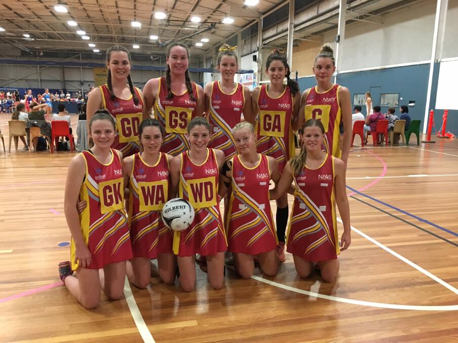 Holding court: The NIAS division one netball team coached by Glen Innes' Kirsty Fuller. 