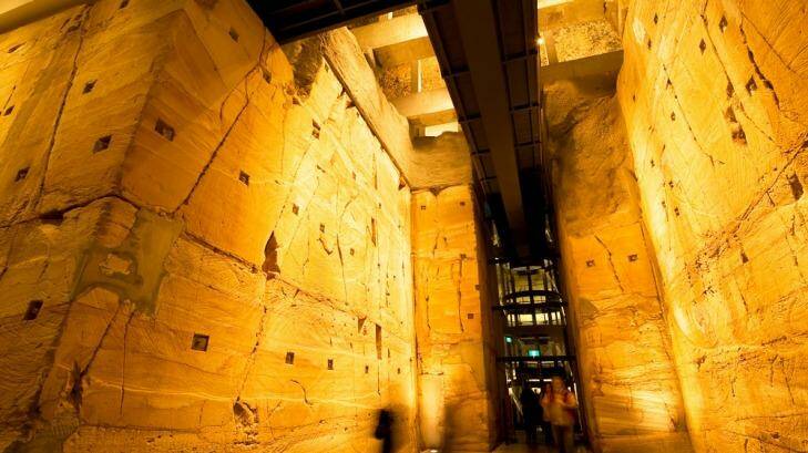 The lowest level of the Museum of Old and New Art includes a 240-million-year-old, 12-metre-high sandstone wall, a full cocktail bar, and various artworks.  Photo: Mona Gallery