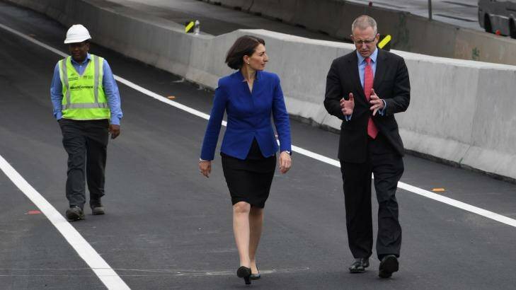 NSW Premier Gladys Berejiklian and Federal Urban Infrastructure Minister Paul Fletcher opening an early section of WestConnex at Homebush.  Photo: Louise Kennerley