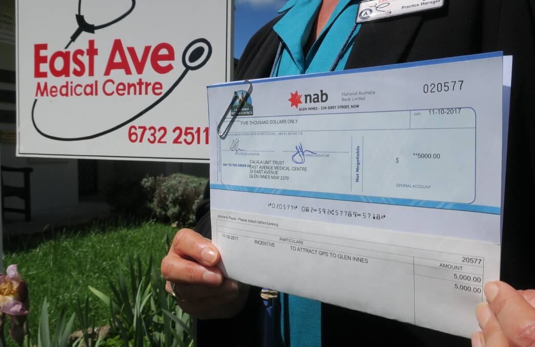 The council cheque for $5,000 to help recruit doctors.