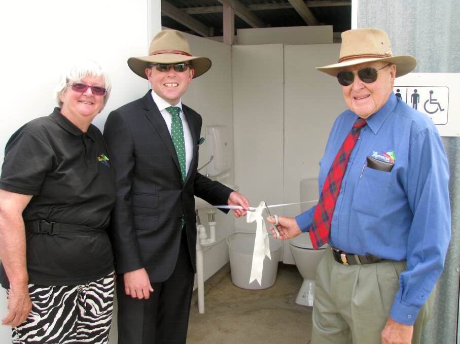Tricia Stack, Adam Marshall, Alex Robertson-Cuningham open the loo at Deepwater racecourse
