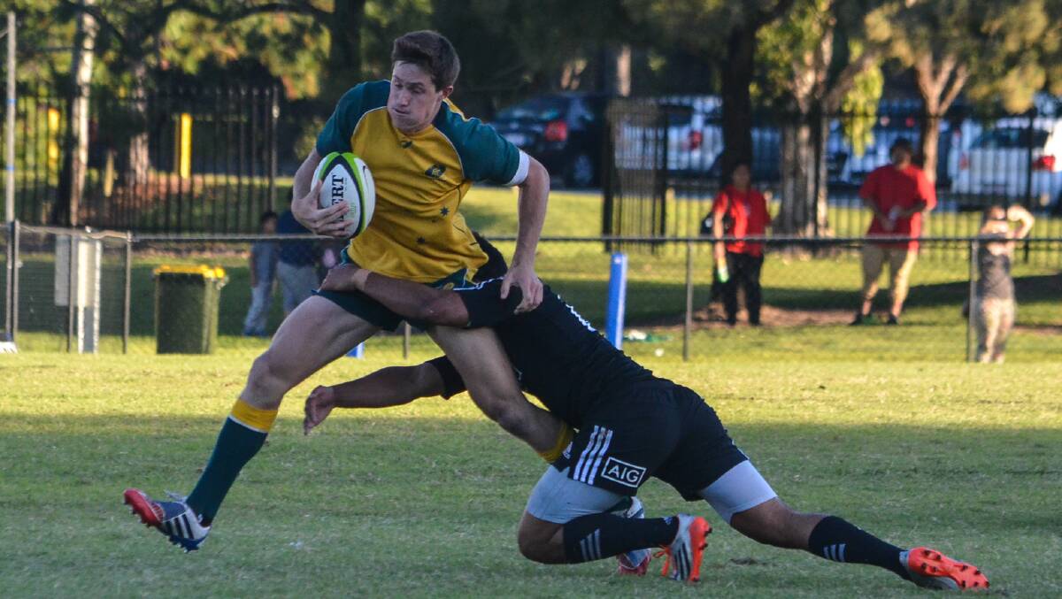 Newsome takes on New Zealand during the Oceania Junior Rugby Championship. Photo by HJ Nelson