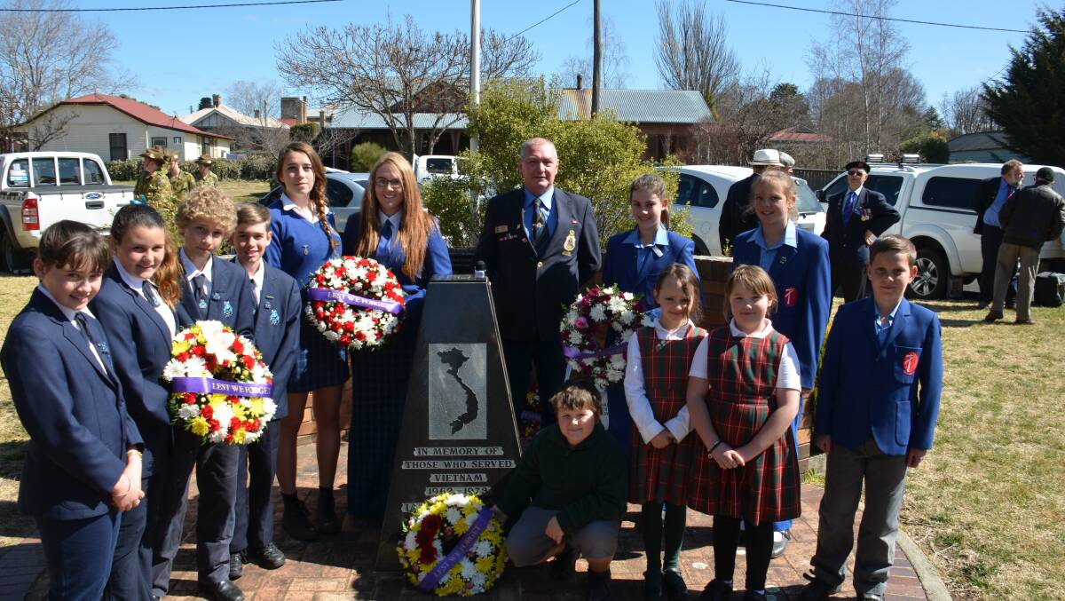 Students from Glen Innes schools lay wreaths at the 50th anniversary Vietnam War commemoration with Glen Innes RSL Sub-branch Gordon Taylor
