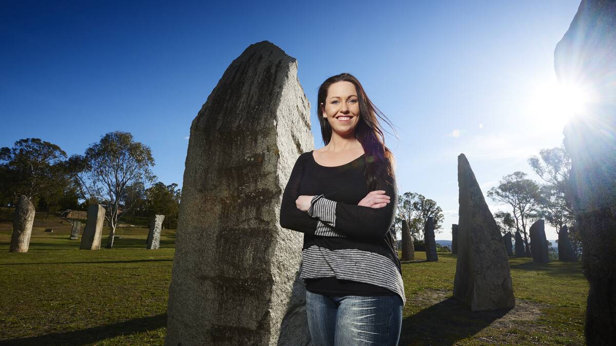The cover shot on this year's Yellow Pages of Cassandra Newsome at the Standing Stones.