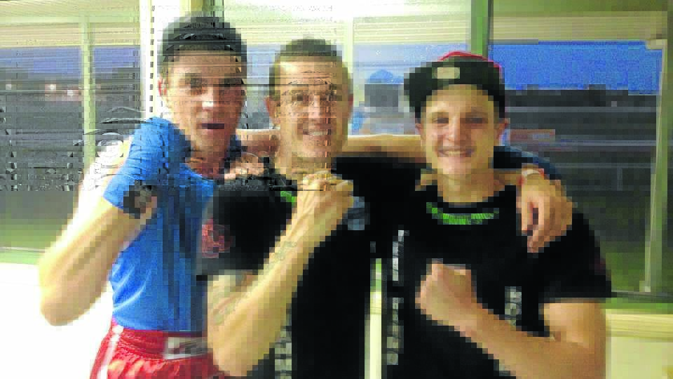 o Victorious: Team Hammo Boxing; from left Jayden Connell, Michael Hamilton and David Wagner.