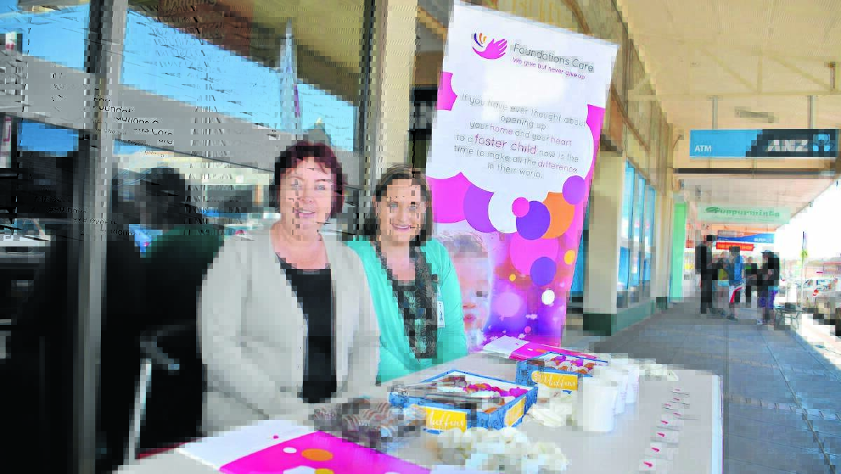 From the heart: Foundations Care caseworkers Wendy Hardman and Leah Hall were part of a promotion in front of Bi-Lo last week, raising awareness for Child Protection Week and encouraging locals to consider becoming a foster carer.