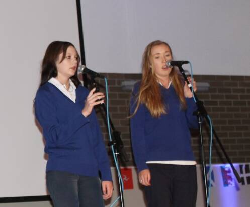 Glen Innes High School students Emily  Winter and Shannen Rolfe perform in duet.