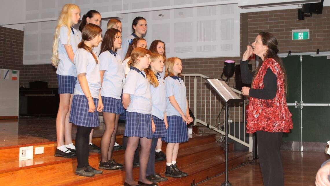 The Glen Innes High School Choir under the hand of Nicole Schaffer gave a moving performance of 'Isn't She Lovely'.