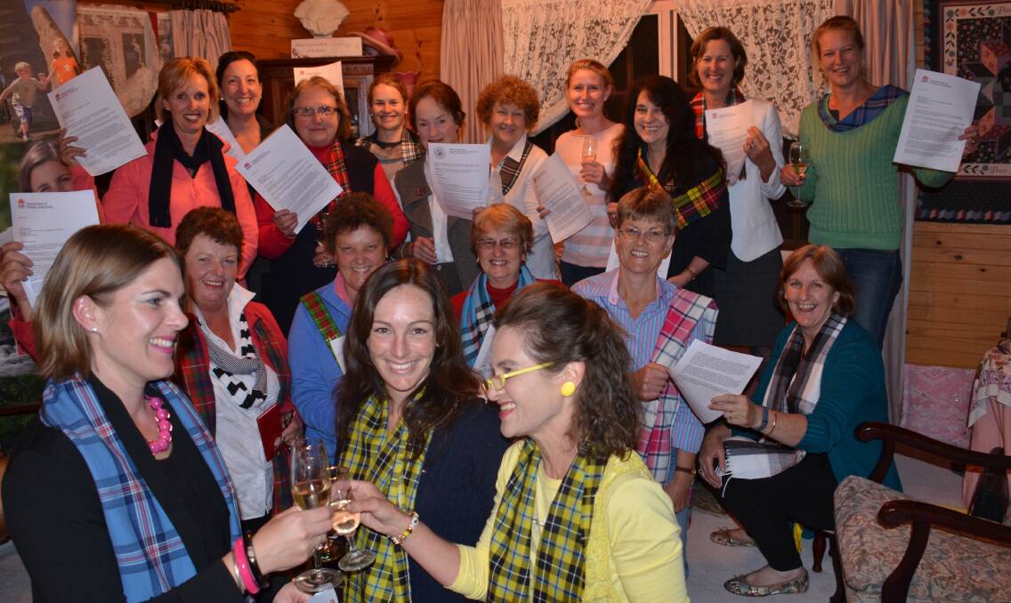 o Cheers: (At front) Anna Watt (vice chair), Pam Benton (GLENRAC liaison) and Mary Hollingworth (chair) toast the news that the 2015 NSW Rural Women’s Gathering will be held in Glen Innes, along with committee members (kneeling, from left) Pauline Smith, Sally Chappell, Yvonne Gorman, Julie Anne Grob and Maryn Burgess, and (standing, from left) Jacqui Cave, Nellie Hayes, Loretta Piestch, Laura Hollingworth, Maureen Mathewson, Dawn Dowling, Dianna Stevens, Julie Clement, Jane Newsome and Pip Grieve. (Absent were Helen Mackay and Kae Klingner.)