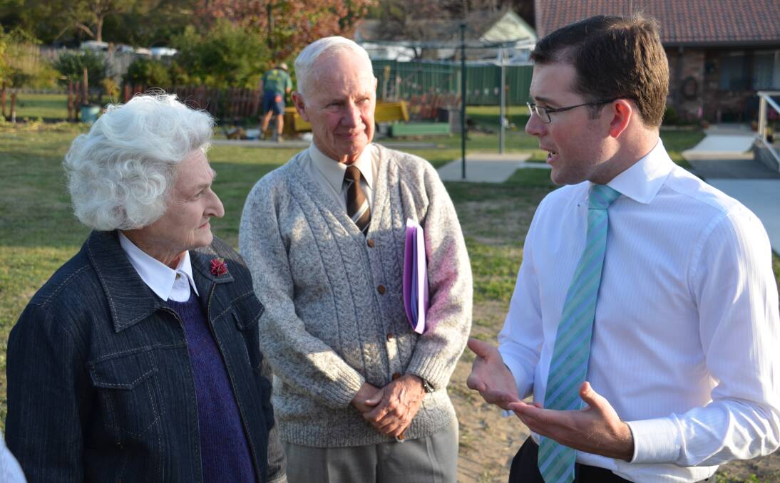 o Keep it coming: Karinya committee members Gwen Parker and John Page discuss further development options with member for Northern Tablelands Adam Marshall.
