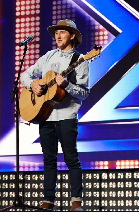 o Rising star: Glen Innes boy Tim Rossington takes centre stage on The X Factor, progressing through the audition stage to make Boot Camp.