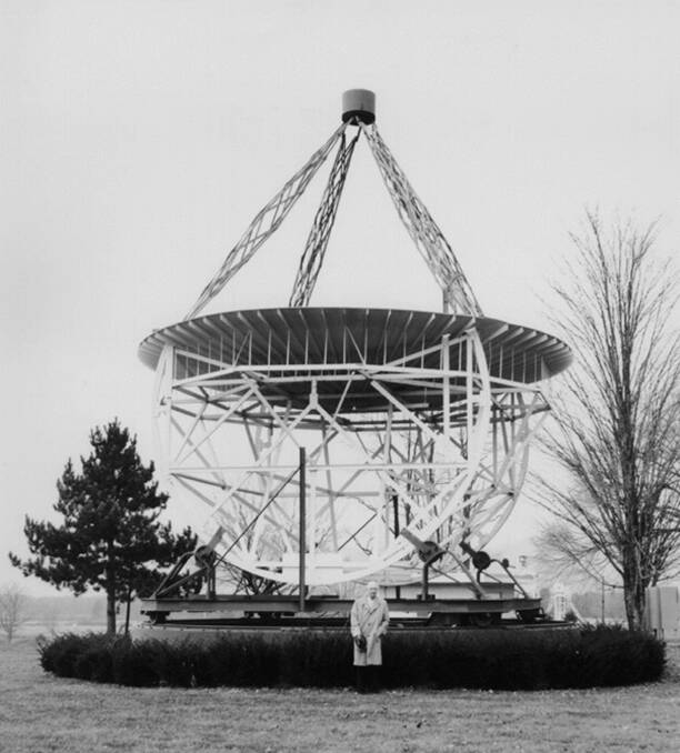 Grote Reber in the foreground with his dish. The dish was removed from his backyard to Green Bank Observatory.