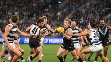 Port Adelaide roared to a huge early lead before clinging on in a thriller against Geelong. (Julian Smith/AAP PHOTOS)