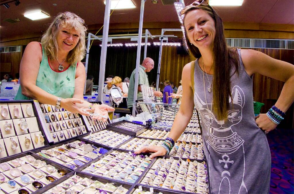 Gem bonanza: Pictured at last year's Minerama Fossicking, Gem and Jewellery Show stall are Preyas Braalman and Christie Scott from Mt Tamborine. PHOTO: Tony Grant