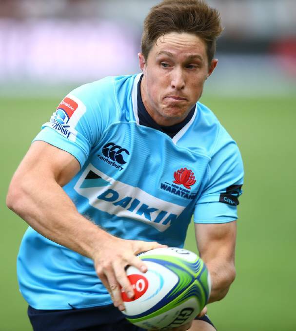 CRUCIAL EFFORT: Glen Innes native Alex Newsome helped seal victory for the NSW Waratahs over the Queensland Reds. Photo: Supplied 