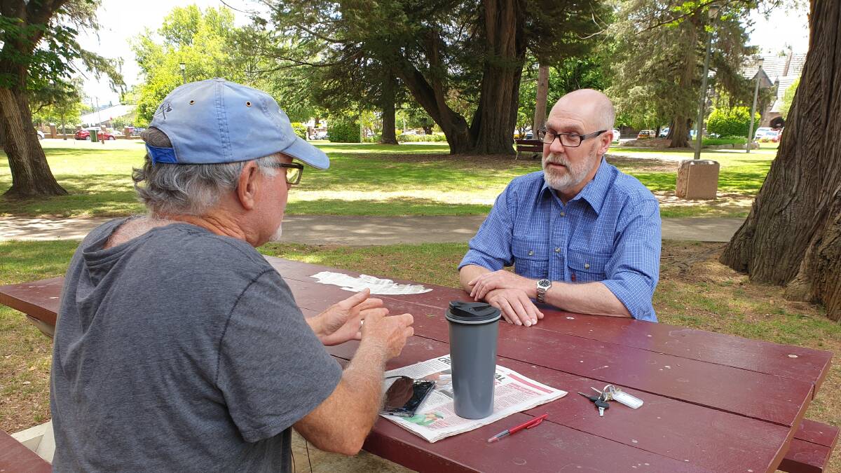 Lifeline Counsellor Peter Barton seated in Central Park on Thursday says talking to someone is the key to managing worrying and sad times. 