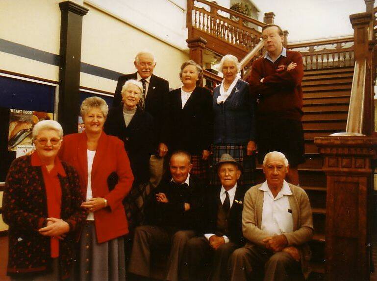 Familiar faces these on that magnificent staircase! Mackenzies staff: Harry Christoe, Jean Webber, Lil Tucker, Garry Donnelly, Helen Christoe, Shirley Chappell, Marlene Slee, Noel Slade, Stan Cook, Walter Beness
