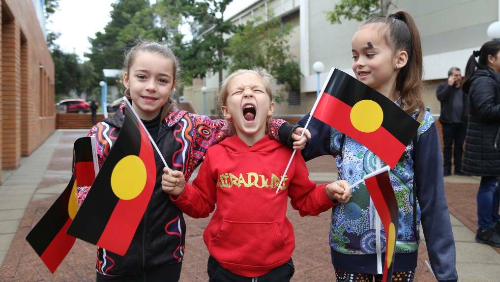 PORT STEPHENS: 2019 NAIDOC Week in Port Stephens - march through Raymond Terrace and opening flag raising ceremony in Raymond Terrace. Lola Bovill, 8, Louie Bovill, 6, and Scarlett Hunt, 7.