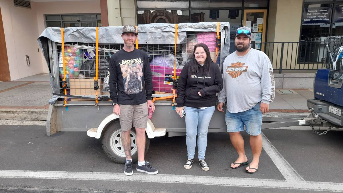 READY TO ROLL: Tiffany Dawson with Dwayne and Jeremy before the cargo left Glen Innes. Picture: Supplied