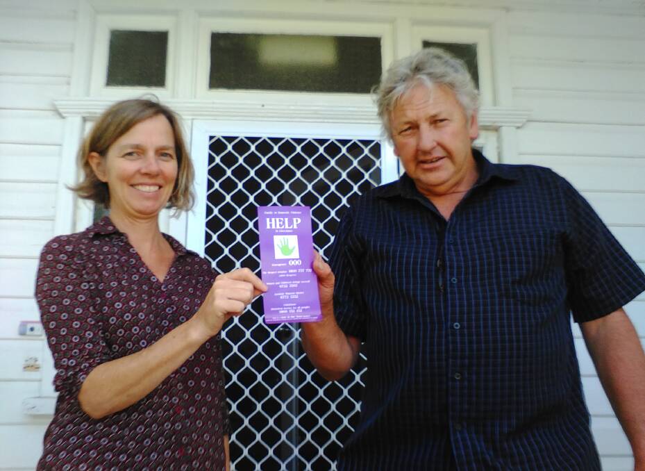 Louise Morley and Laurie Newsome with one of the information cards.