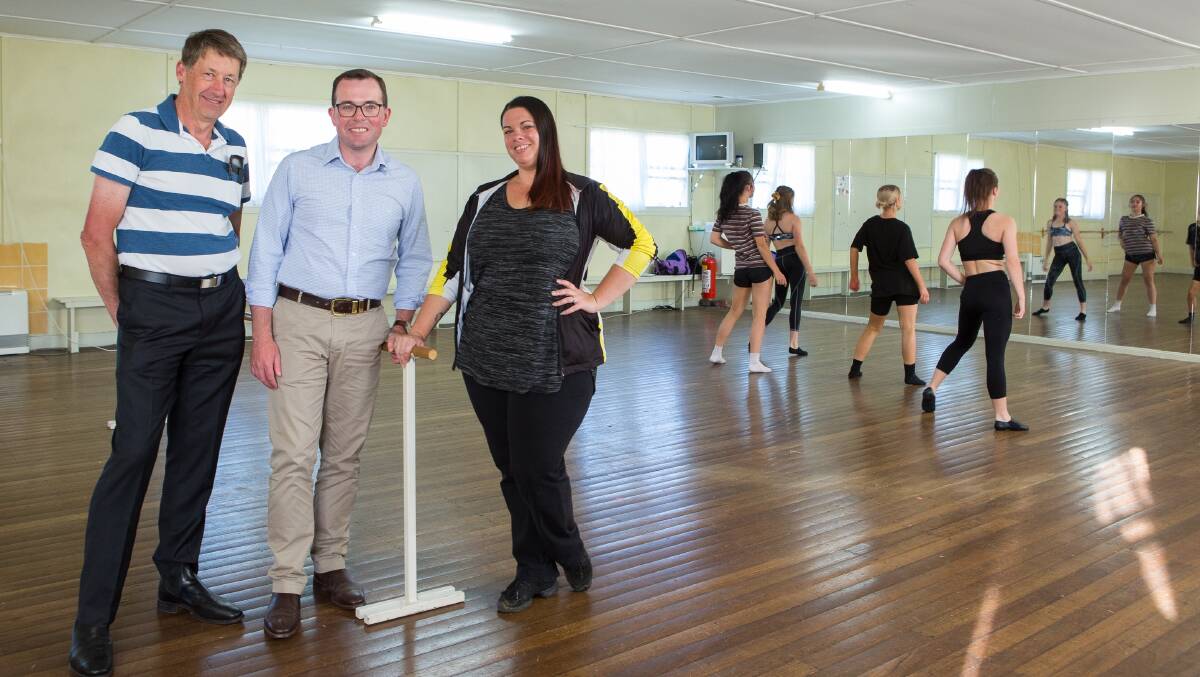 Glen Innes Severn Councillor Steve Toms, Northern Tablelands MP Adam Marshall and dance instructor Donna Jarrett in the Glen Innes Girl Guides Hall this week.
